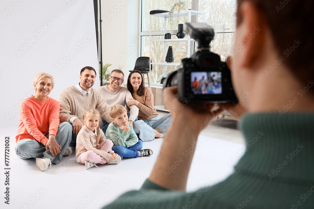 Big family having photo shoot in studio