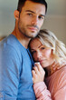 © peopleimages.com - Couple, divorce and hug in portrait for love, relationship or memories together. Man, woman and sad embrace for breakup, compassion or care in home for supporting, commitment and trust issue