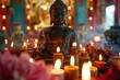 Buddha statue surrounded by candles