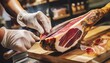 Expert delicatessen slicing jamon, the traditional Spanish cured ham. In a rustic setting, the jamon rests on a wooden cutting board, ready for serving.