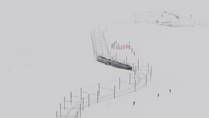 Wall Mural - Zermatt, Switzerland - The train of Gonergratbahn running to the Gornergrat station in the famous touristic place with clear view to Matterhorn during a heavy snow storm. 