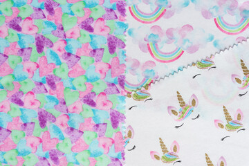  crafting fabrics with hearts, rainbows, and unicorn prints