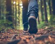 Close-up view of a business individual strolling through nature, focus on shoes treading a forest trail, embracing digital detox.