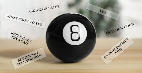 Wall Mural - Magic eight ball on wooden table and different predictions around it. Banner design