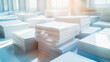 © Na-No Photos - Stacks of blank white paper on a bright, sunny desk, suggesting a busy office or print environment, Reduce paper reduce carbon, Quit using paper, save trees, go digital