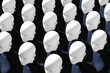 © Marcos Osorio/Stocksy - A group of robots with Artificial Intelligence