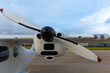 © Luis Velasco/Stocksy - Detail Of An Airplane Parked Before Flying.