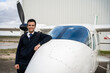 © Luis Velasco/Stocksy - Portrait Of An Airplane Pilot.