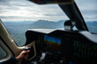 © Luis Velasco/Stocksy - Anonymous Pilot, And Of Controls Of An Aircraft Cabin.