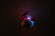 © Aria Ng/Stocksy - Disco balls reflecting light in a room