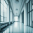 © Artpsd - Beautiful light blue blurred background panoramic image of a spacious office or mall hallway.