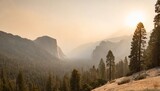 Fototapeta  - landscape in sequoia national park in sierra nevada mountains on a sunny day smoke from wildfires visible in the background covering the fresno area