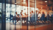 © melhak - Business Meeting Behind Glass Wall - Corporate Teamwork and Office Dynamics - blurry out of focus workplace collaboration image.