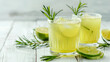 Tasty refreshing lemonade and ingredients on light table summer drink ,Homemade lemonade with Estragon leaves and Lemon

