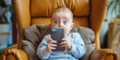 Baby toddler kid holding mobile smartphone with shocked facial expression. Kid watching prohibited content. Child gadget addiction parent control protection concept