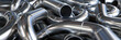 Background of metal twisted pipes. Brilliant clean indirect tubes.