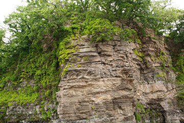 Canvas Print - rock wall on the beach