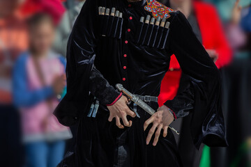 September 17, 2023. Belarus. city of Gomel. A holiday of ethnic cultures of different peoples and nationalities.A Georgian man in a national costume with a dagger.