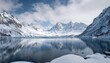 © RocknRoller Studios - Beautifully Calm Lake, Reflecting Majestic Snowy Mountains. Winter Background.