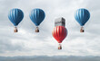 Competitive struggle and business disadvantage. Hot air balloons racing to the top but the laggard is prevented by obstacles from rising, he uses his willpower