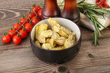Fototapeta Kuchnia - Grilled artichoke marinated in oil