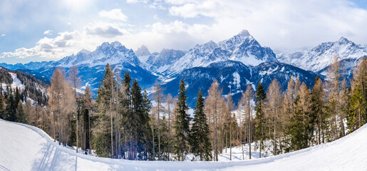 Wall Mural - Wide panoramic view of winter landscape with snow covered Dolomites in Kronplatz, Italy