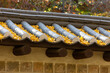 Yellow fallen leaves on a tile roof in Korea