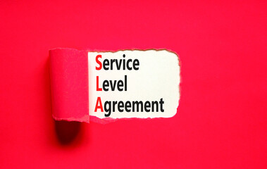Wall Mural - SLA service level agreement symbol. Concept words SLA service level agreement on beautiful white paper. Beautiful red paper background. Business SLA service level agreement concept. Copy space.