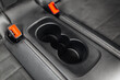 Modern car cup holder at the rear seats row