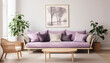 © HecoPhoto - A stylish living room with a purple sofa plants and a picture of trees on the wall