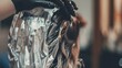 Generative AI : Hairdresser is applying bleaching powder on woman's hair and wrapping into the foil.