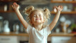Delighted young girl with joyful expression celebrating in a sunlit home interior, embodying happiness and innocence.