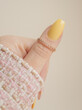 Beautiful art manicure. Spring, summer manicure design ideas. Nail polish. Stylish yellow nail.