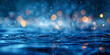 Glistening water background with blurred light dots in a cool blue tone