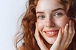 Exuberant European woman with natural beauty. Close-up of a cheerful young woman with clear skin and a natural look, exuding happiness and health