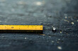 Comparative Visualization of Millimeters and Kilometers Featuring an Extreme Close-up of a Ruler