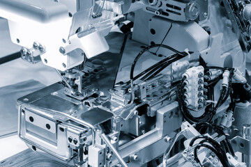 Aufkleber - Professional sewing machine and sews garments,  textile fabric production industrial concept background