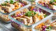 Meal prepping is made easy with these healthy containers. They're filled with quinoa, chicken, and coleslaw—a satisfying and nutritious combination.
