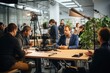 © SaroStock - group of people brainstorming in a conference room with a camera on a tripod capturing the moment