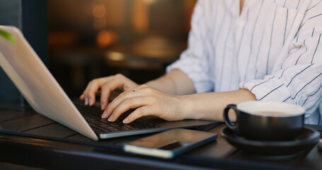Poster - Hands, typing and cafe with laptop, remote work and busy for job, online creative and internet. Technology, coffee and entrepreneur for freelance career, copywriter and working on social media