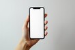 Close-up image of a woman using her smartphone. smartphone white screen mockup for display your graphic banner
