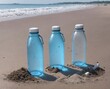 Three blue plastic water bottles on a sandy beach with the ocean in the background.