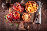 Fototapeta Na sufit - Hot roasted ham hock as regional dish in Poland.
