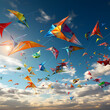 A cluster of colorful kites flying in the sky. 