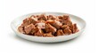 Wet cat food on a white plate cutout. Feeding plate full of meat and liver pieces in a sauce for cats isolated on a white background.