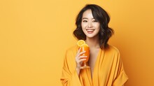 Beautiful Young Woman In Bathrobe Drinking Homemade Orange Juice Smiling  Standing Near