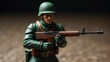 © sitifatimah - Detailed image of a toy soldier in uniform holding a rifle, focused with a blurred background