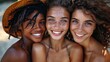 Happy multiracial women with different bodies and skin types having fun on a hot summer day on the beach - focus mainly on the faces of African girls.
