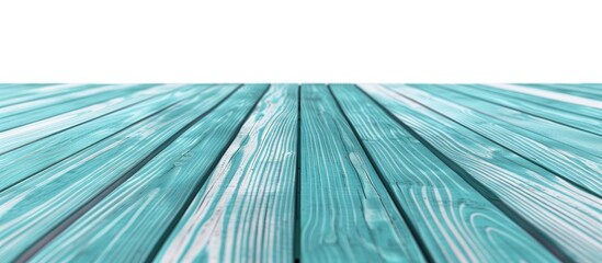 Sticker - A rectangle of electric blue water contrasts with the calm aqua sky, reflecting the symmetry of a triangle building on the parallel wooden deck