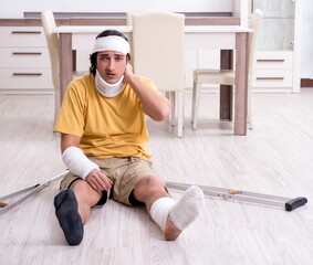 Wall Mural - Young man after accident recovering at home